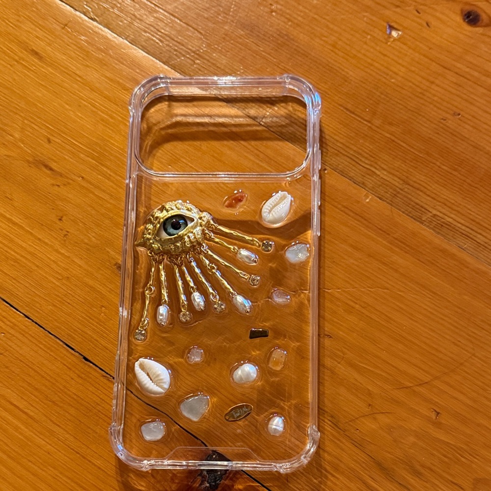 Elegant Clear Phone Case with Gold and White Details
